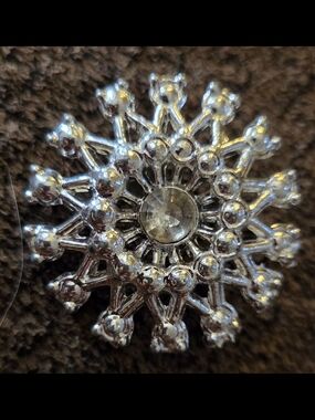 Vintage Silver Sunburst Brooch with Clear Center Stone